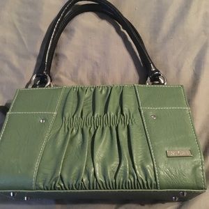 Miche Green shell with black base bag.